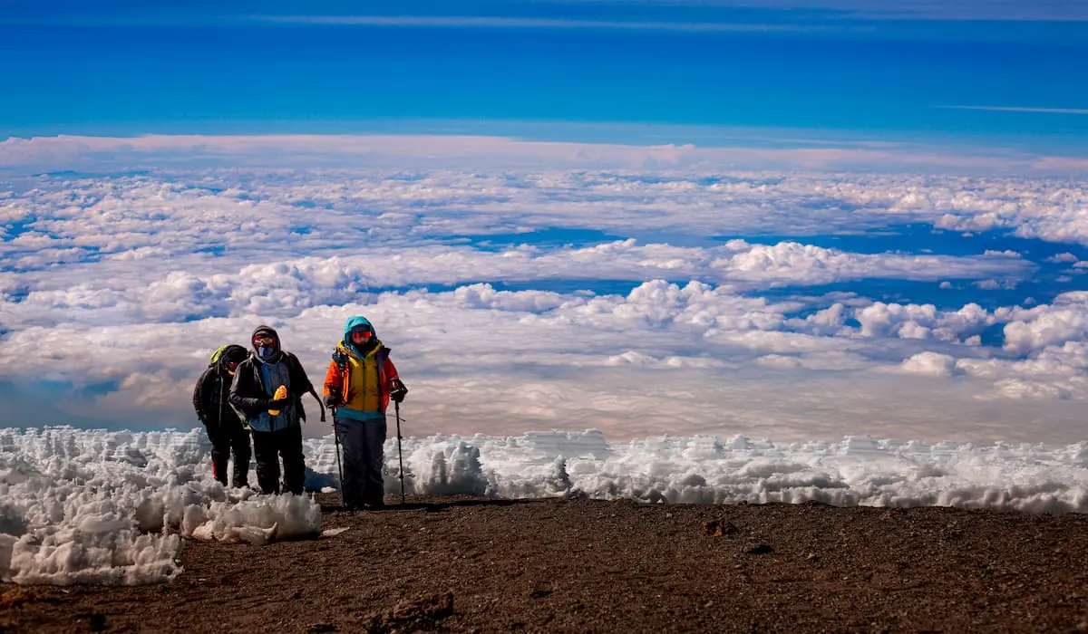 Happy hikers on Kilimanjaro Happy hikers on Kilimanjaro